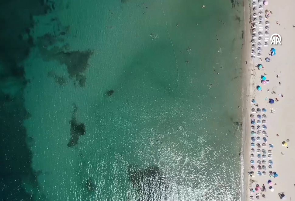 Erdek’in Turanköy’ü Turkuaz Deniziyle Turist Akınına Uğruyor